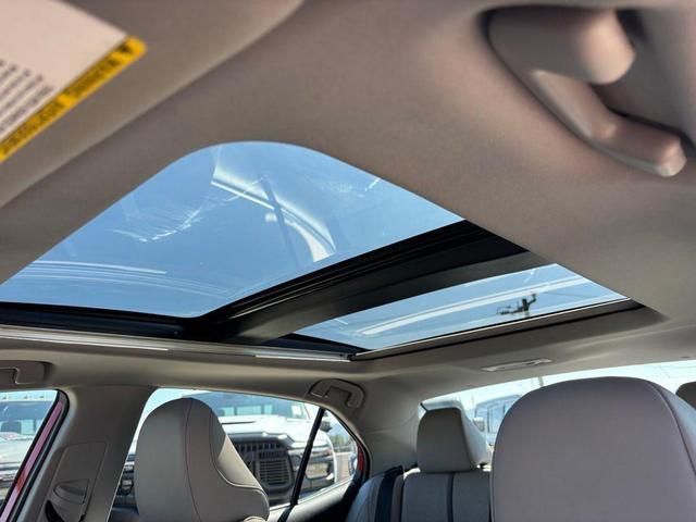 Photo of 2023 Supersonic Red Toyota Camry