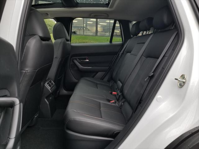 Photo of 2025 Wind Chill Pearl Mazda CX-50 Hybrid