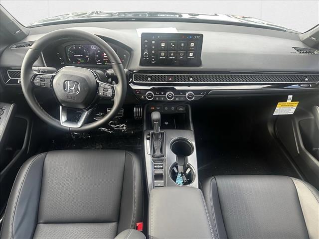 Photo of 2026 Blue Lagoon Pearl Honda Civic Hybrid