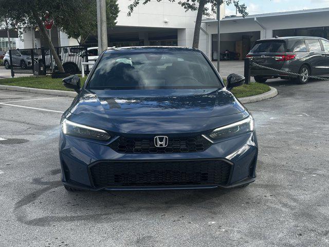 Photo of 2026 Blue Lagoon Pearl Honda Civic Hybrid