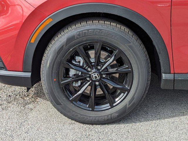 Photo of 2026 Radiant Red Metallic Honda CR-V Hybrid