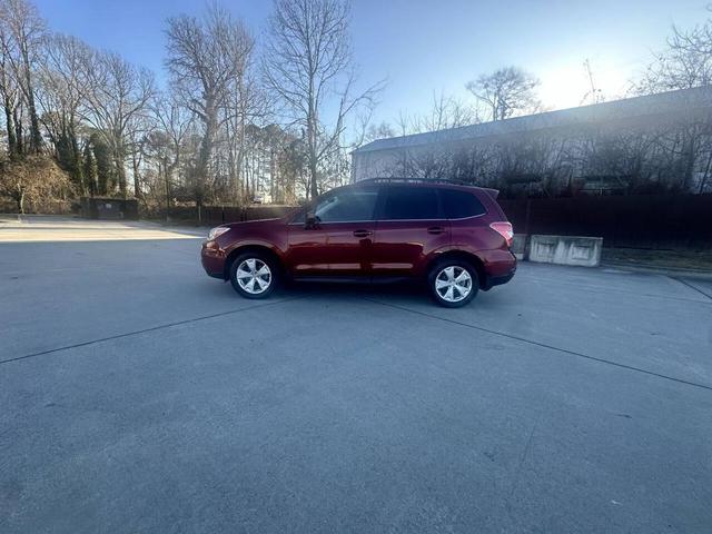 Photo of 2014 Venetian Red Pearl Subaru Forester