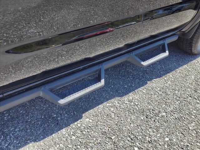 Photo of 2024 Super Black Kh3 Nissan Frontier