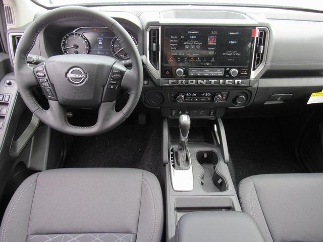 Photo of 2025 Glacier White Nissan Frontier