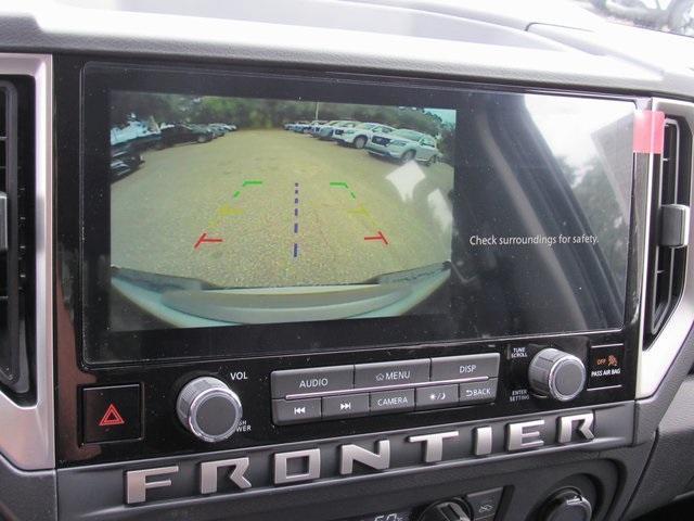 Photo of 2025 Glacier White Nissan Frontier