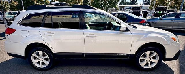 Photo of 2014 Satin White Pearl Subaru Outback
