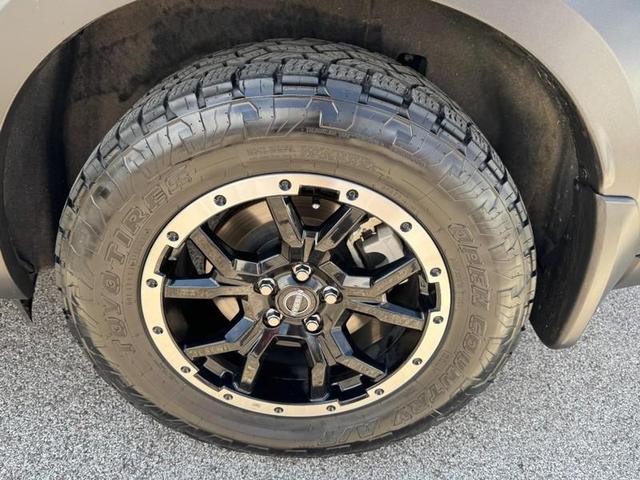 Photo of 2023 Obsidian Green Pearl Nissan Pathfinder
