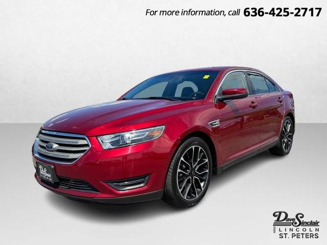 Photo of 2017 RUBY RED TINTED CLEARCOAT Ford Taurus