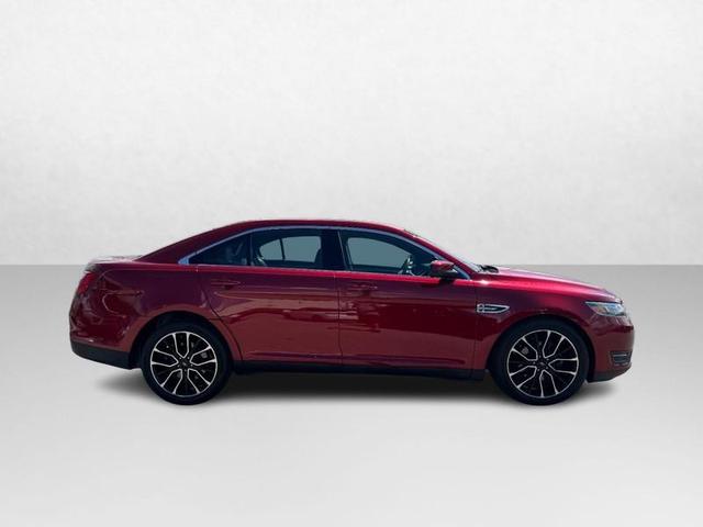 Photo of 2017 RUBY RED TINTED CLEARCOAT Ford Taurus