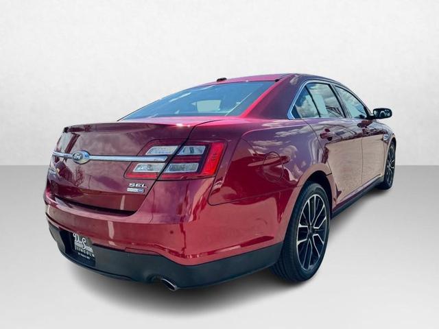 Photo of 2017 RUBY RED TINTED CLEARCOAT Ford Taurus