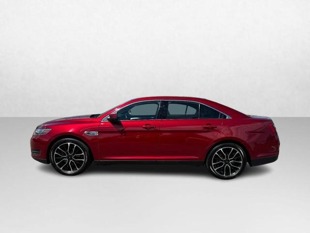 Photo of 2017 RUBY RED TINTED CLEARCOAT Ford Taurus