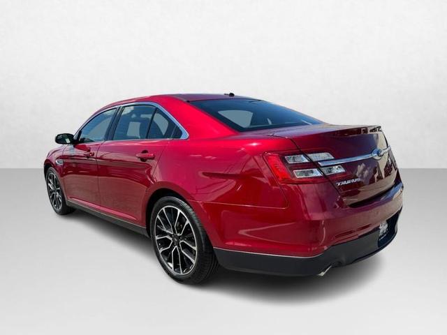 Photo of 2017 RUBY RED TINTED CLEARCOAT Ford Taurus