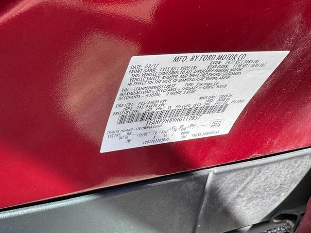 Photo of 2017 RUBY RED TINTED CLEARCOAT Ford Taurus