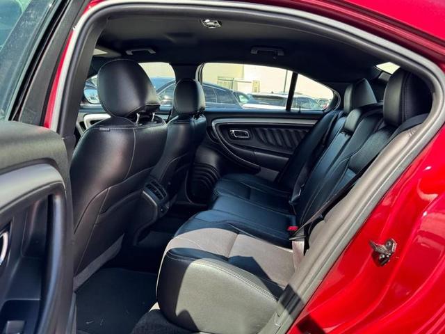 Photo of 2017 RUBY RED TINTED CLEARCOAT Ford Taurus