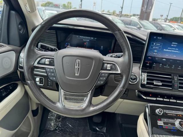 Photo of 2023 CHROME CAVIAR DARK GRAY MET Lincoln Navigator