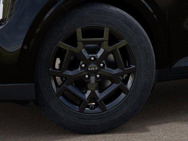 Photo of 2025 Aurora Black Pearl Kia Carnival