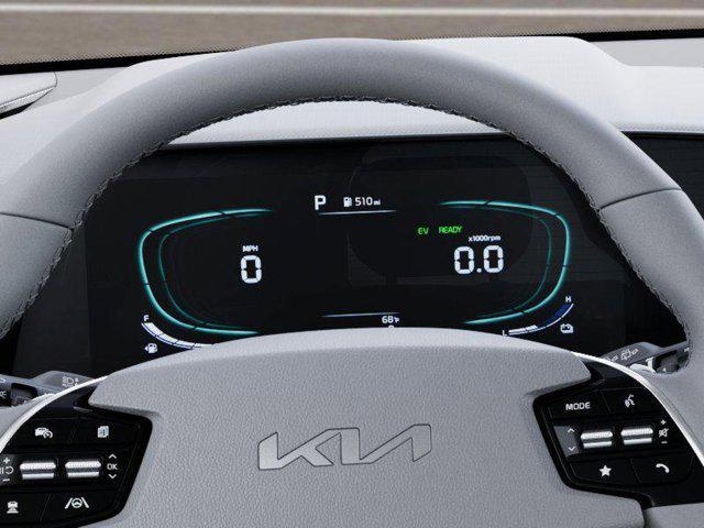 Photo of 2025 Cityscape Green Kia Niro