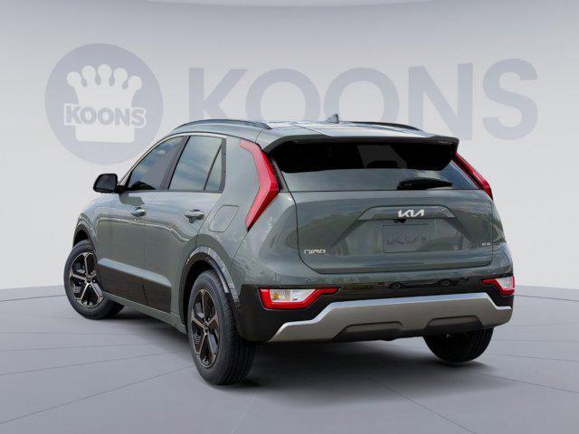 Photo of 2025 Cityscape Green Kia Niro