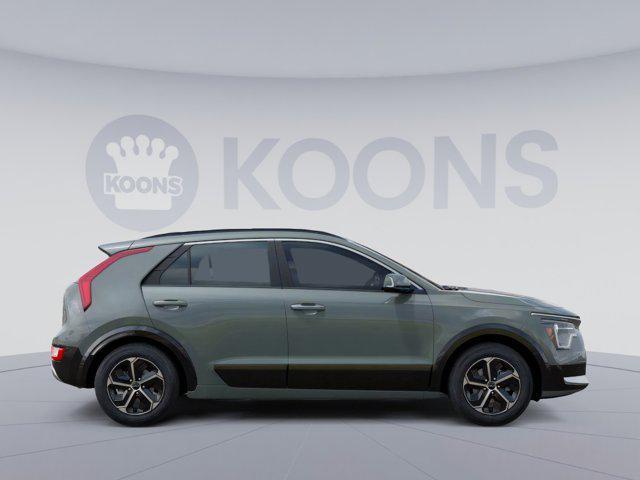 Photo of 2025 Cityscape Green Kia Niro