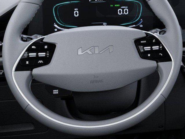 Photo of 2025 Cityscape Green Kia Niro