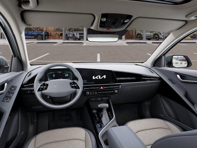 Photo of 2025 Cityscape Green Kia Niro