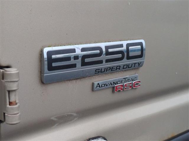 Photo of 2014 Pueblo Gold Metallic Ford E250