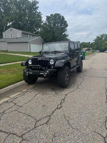 Photo of 2015 Black Clearcoat Jeep Wrangler Unlimited