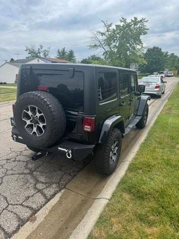 Photo of 2015 Black Clearcoat Jeep Wrangler Unlimited