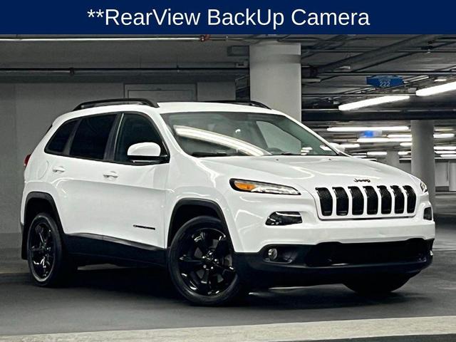 Photo of 2018 Bright White Clearcoat Jeep Cherokee