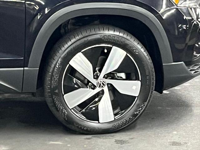 Photo of 2024 Deep Black Pearl Volkswagen Taos
