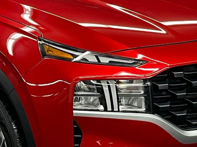 Photo of 2023 Calypso Red Hyundai SANTA FE