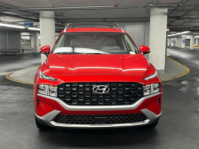 Photo of 2023 Calypso Red Hyundai SANTA FE
