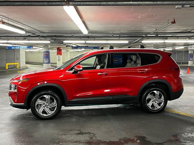 Photo of 2023 Calypso Red Hyundai SANTA FE