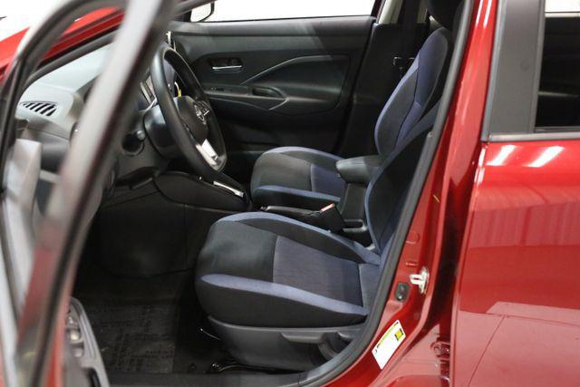 Photo of 2025 Scarlet Ember Tintcoat Nissan Versa