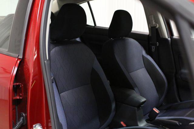 Photo of 2025 Scarlet Ember Tintcoat Nissan Versa