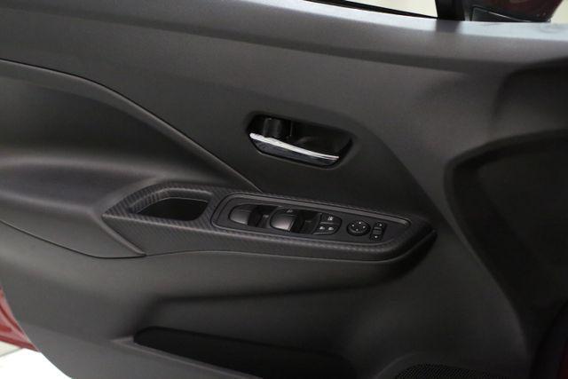 Photo of 2025 Scarlet Ember Tintcoat Nissan Versa