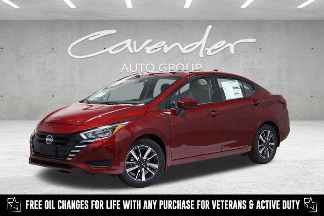 Photo of 2025 Scarlet Ember Tintcoat Nissan Versa