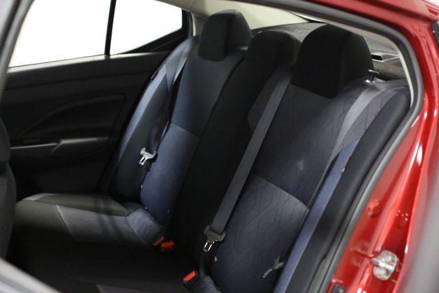 Photo of 2025 Scarlet Ember Tintcoat Nissan Versa