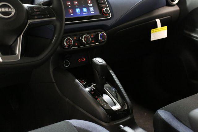 Photo of 2025 Scarlet Ember Tintcoat Nissan Versa