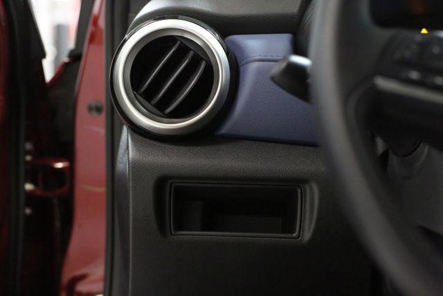 Photo of 2025 Scarlet Ember Tintcoat Nissan Versa