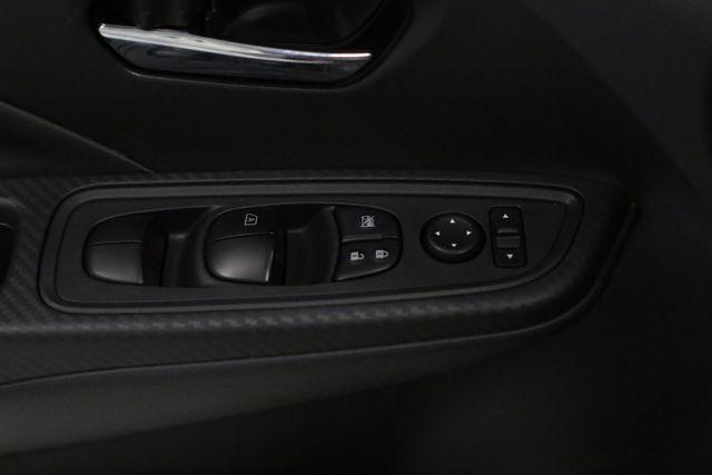 Photo of 2025 Scarlet Ember Tintcoat Nissan Versa
