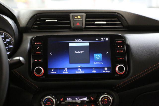 Photo of 2025 Scarlet Ember Tintcoat Nissan Versa