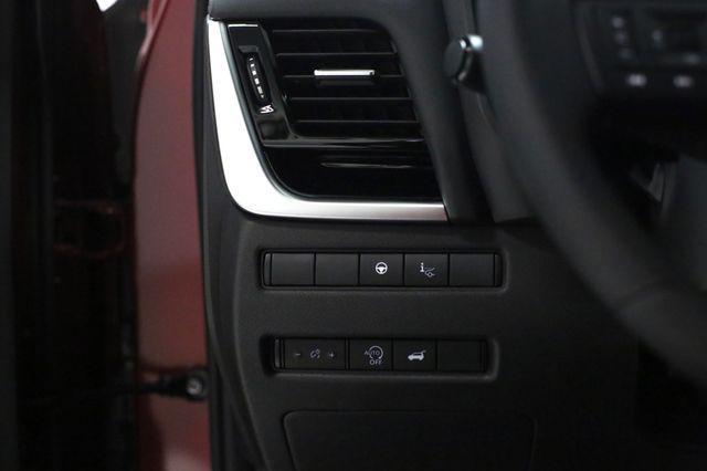 Photo of 2025 Scarlet Ember Tintcoat Nissan Rogue