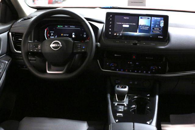 Photo of 2025 Scarlet Ember Tintcoat Nissan Rogue