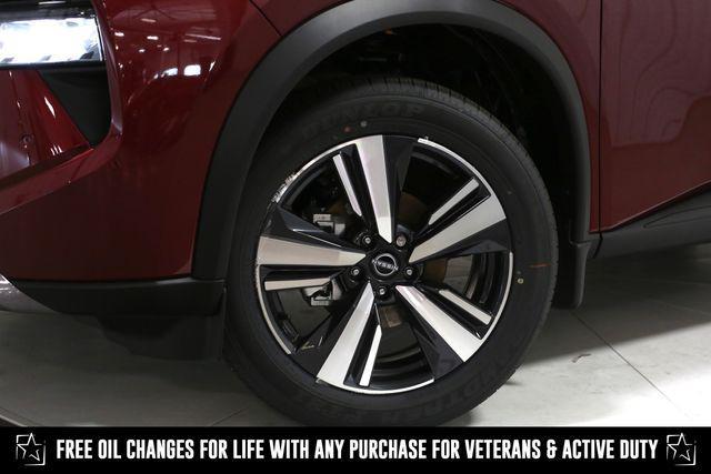 Photo of 2025 Scarlet Ember Tintcoat Nissan Rogue