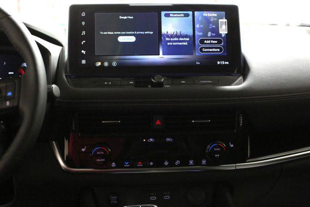 Photo of 2025 Scarlet Ember Tintcoat Nissan Rogue