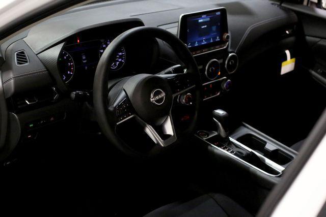 Photo of 2025 Aspen White Tricoat Nissan Sentra
