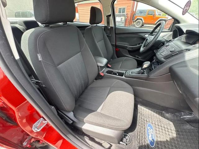 Photo of 2018 Hot Pepper Red Metallic Tinted Clearcoat Ford Focus