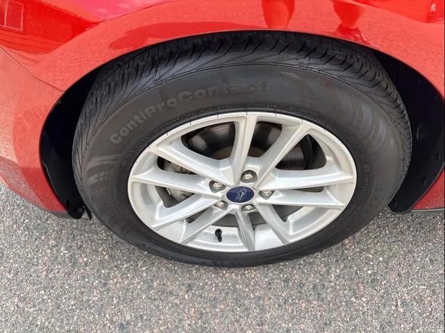 Photo of 2018 Hot Pepper Red Metallic Tinted Clearcoat Ford Focus