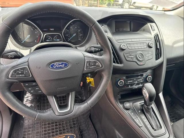 Photo of 2018 Hot Pepper Red Metallic Tinted Clearcoat Ford Focus